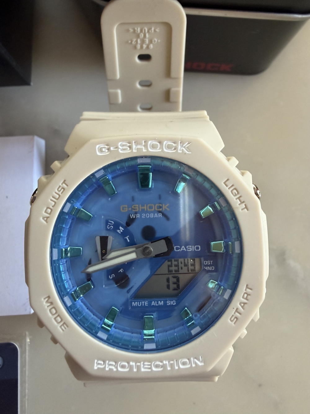 Casio G-Shock Cream Case with Blue Dial Watch